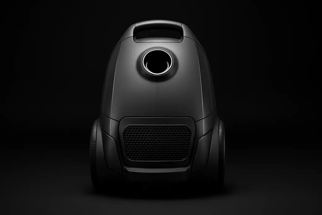 A perfectly centered, sleek vacuum cleaner on a clean black background with soft even lighting and a subtle spotlight highlighting the product details.