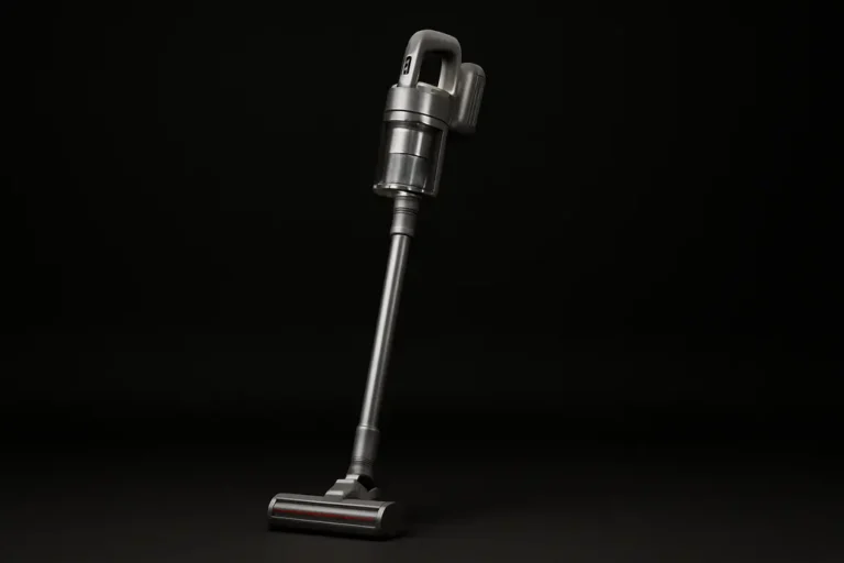 A clean, professional photograph of a complete cordless vacuum cleaner centered against a black background with soft, even lighting and no visible dirt or damage.