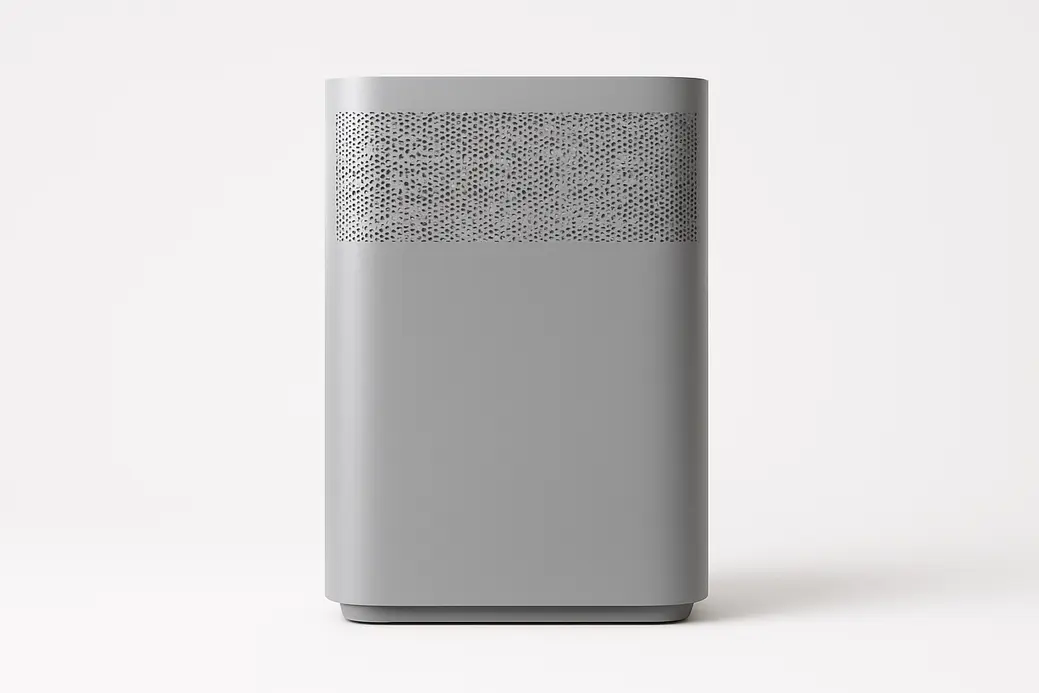 Clean product photo of a grey air purifier centered on a white background, fully visible with soft even lighting and no text or logos
