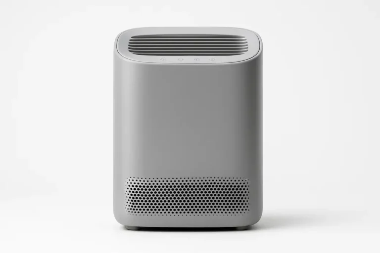 Professional product photo of a grey air purifier centered on a white background with even soft lighting, showing all details clearly and no text or logos.