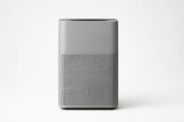 A clean, professional photo of a gray air purifier centered on a white background with soft even lighting and no visible text or branding.