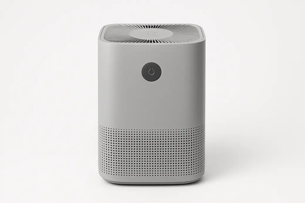 A professional product photo of a single gray air purifier, fully visible and centered on a white background with soft even lighting.