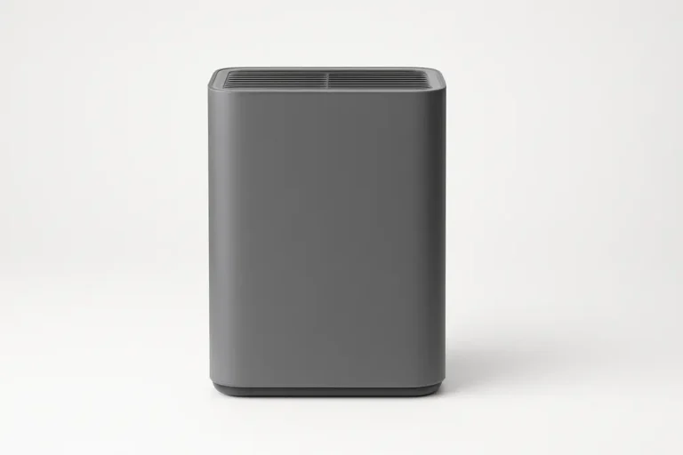 Professional product photo of a single gray air purifier with a smooth matte finish, centered on a seamless white background, without any text or logos.
