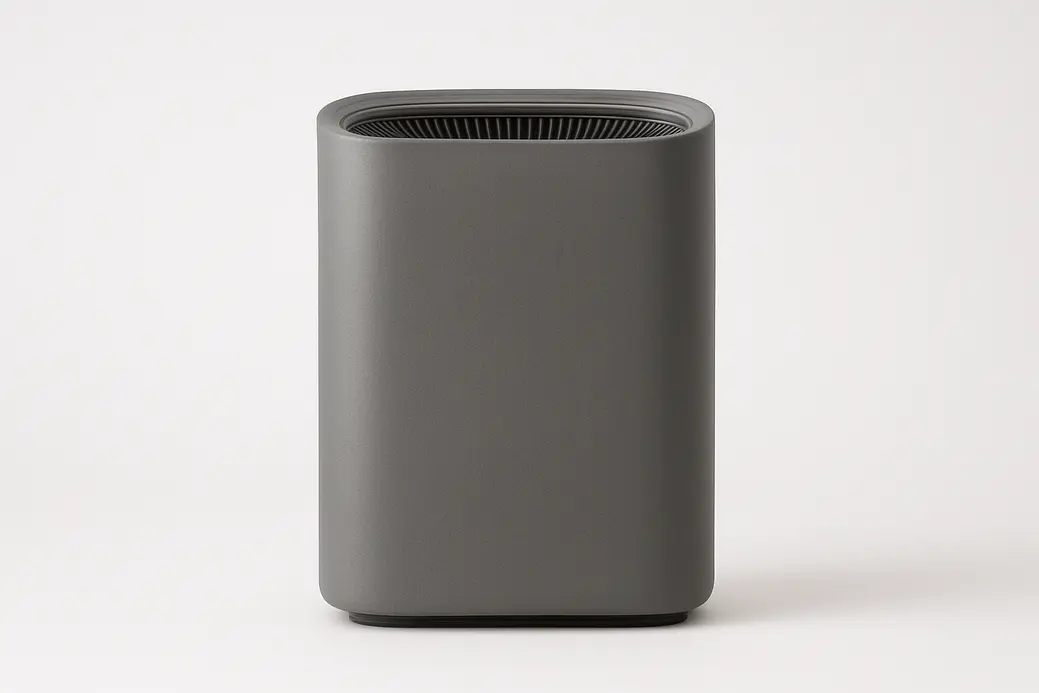A single grey air purifier centered on a white background with even soft lighting, showcasing a clean and polished look with no text or logos visible.