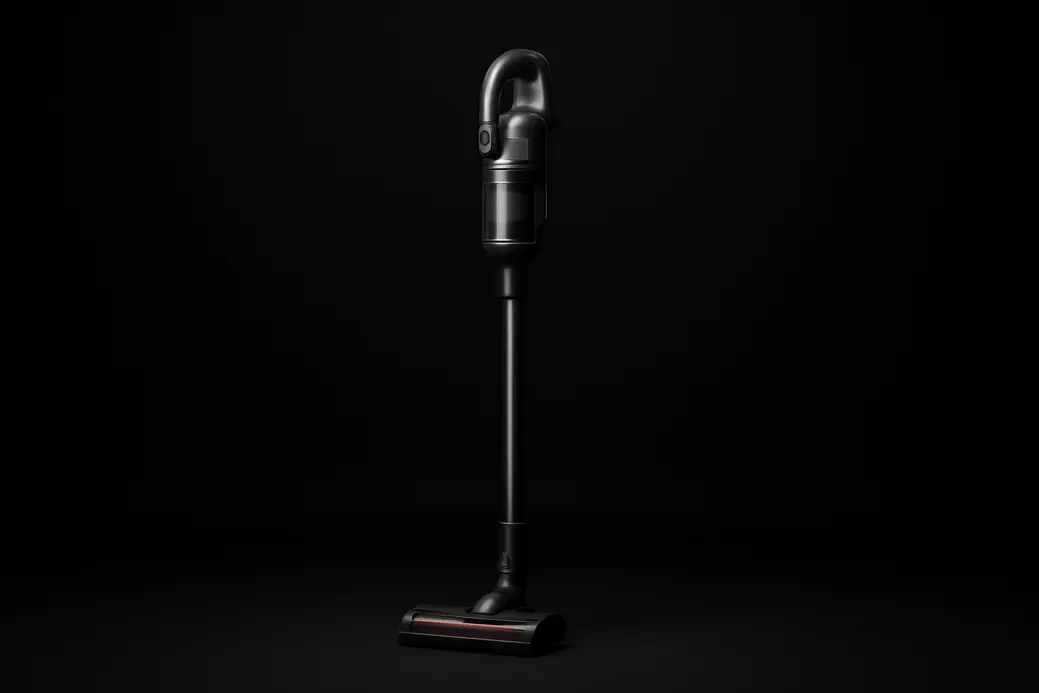 A sleek, complete wireless vacuum cleaner positioned centrally against a black background with soft, even spotlight lighting in a professional studio environment.